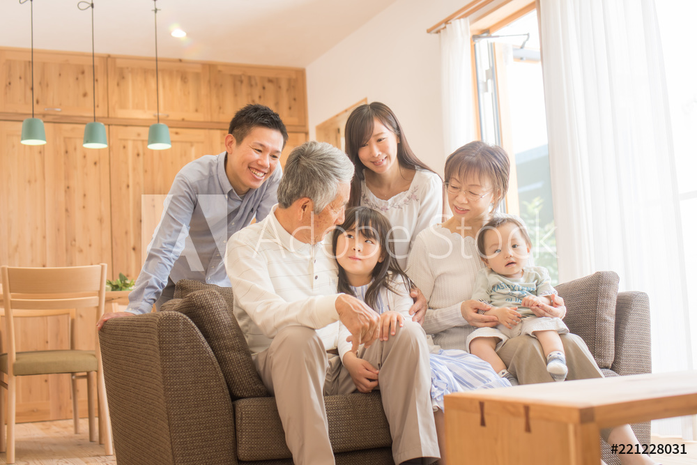 Family in casual group photo in living room